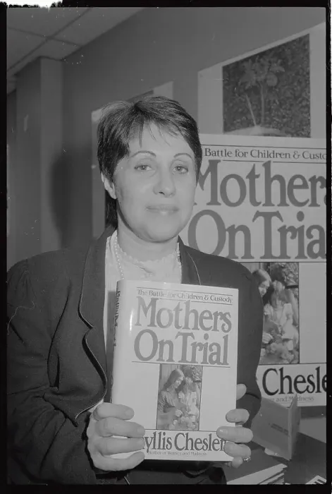 Framed Print : Phyllis Chesler Holding Her Book Framed Print : Phyllis Chesler Holding Her Book