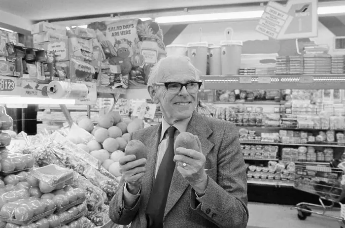 Framed Print : Physician Denis Burkitt Holding Fruit in Supermarket Framed Print : Physician Denis Burkitt Holding Fruit in Supermarket
