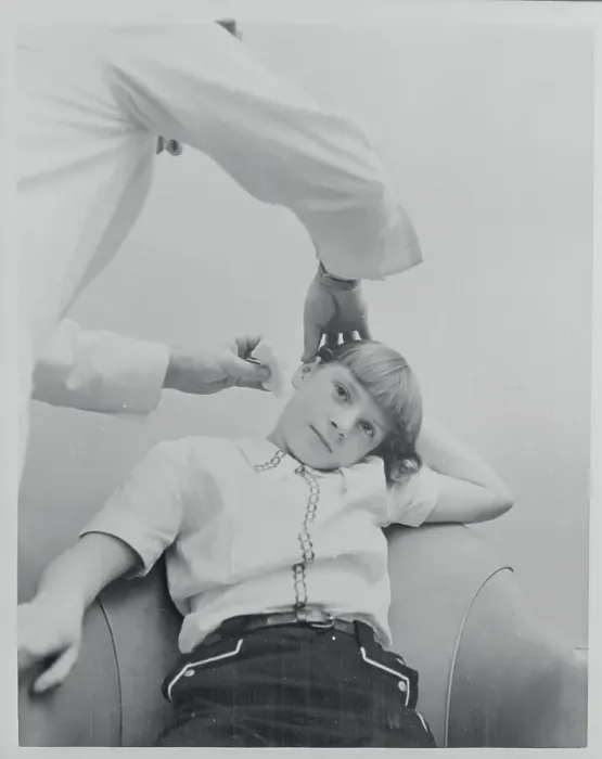 Framed Print : Physician Examining a Young Girl's Ear for Hearing Aid Framed Print : Physician Examining a Young Girl's Ear for Hearing Aid