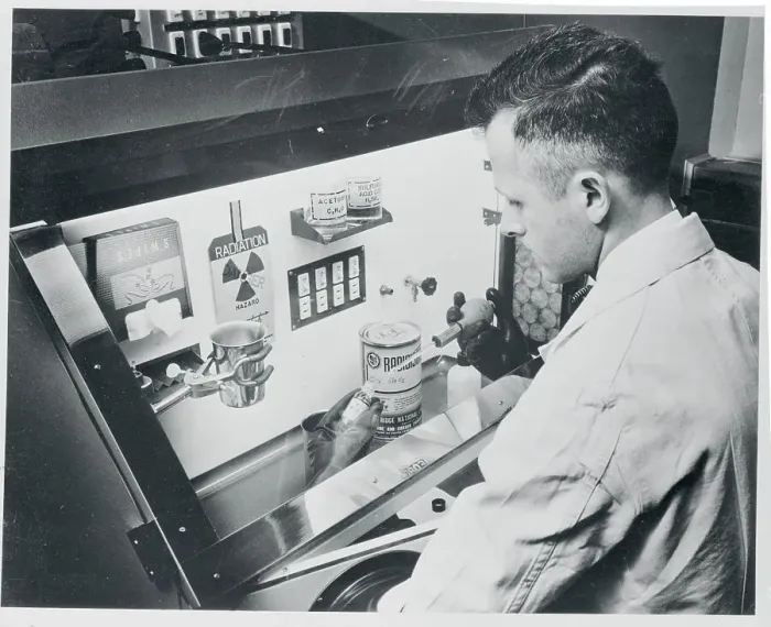 Framed Print : A Physicist Withdrawing Radioactive Liquid From a Vial Framed Print : A Physicist Withdrawing Radioactive Liquid From a Vial