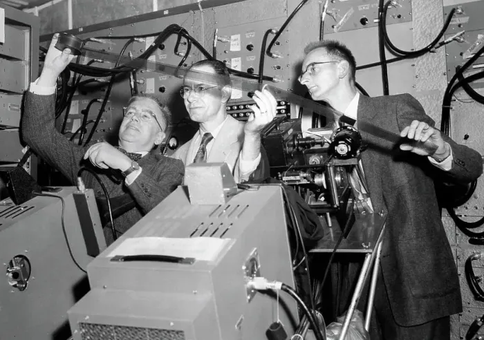 Framed Print : Physicists Looking at Record Beams Framed Print : Physicists Looking at Record Beams