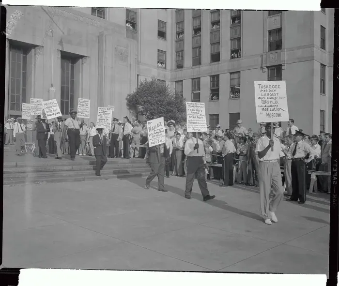 Framed Print : Picketers Carrying Signs in Front of Building
