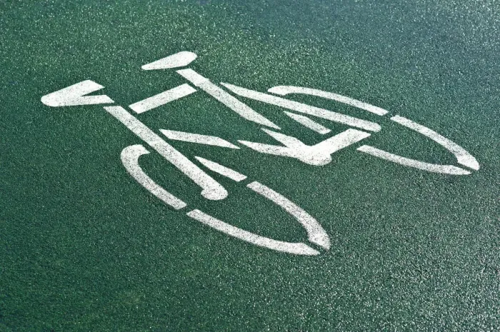 Framed Print : Pictogram, cycle path on gren asphalt Framed Print : Pictogram, cycle path on gren asphalt