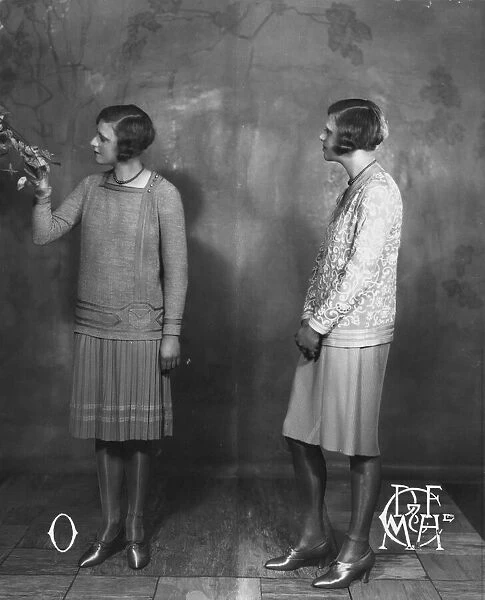 Two Piece. 12th January 1928: Two women modelling two piece suits