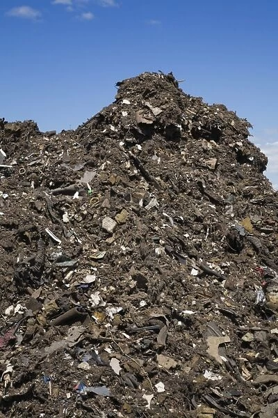 Pile of discarded automotive debris at a waste management site, Quebec, Canada