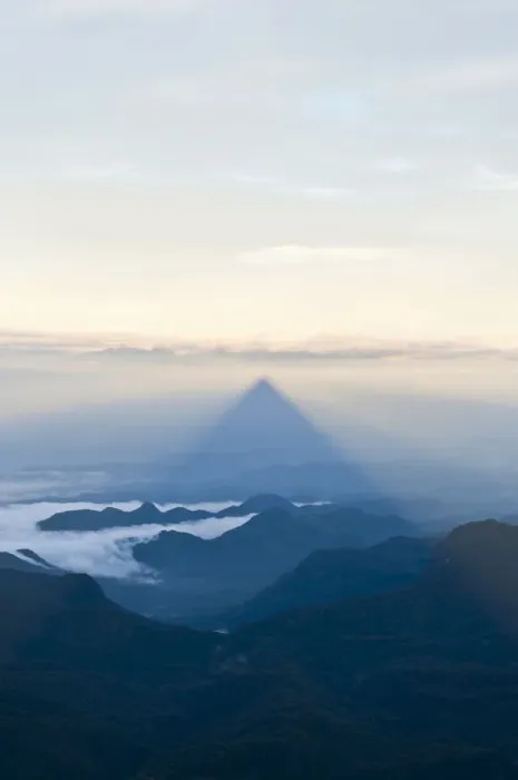 Framed Print : Pilgrim mountain, sun creating a triangle shadow in the landscape, image of God, Buddhist temple, Adams Peak, Sri Pada, Dalhousie, Zentrales Hochland, Sri Lanka