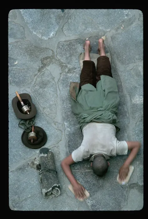 Framed Print : Pilgrim Prostrates Himself at Temple Framed Print : Pilgrim Prostrates Himself at Temple
