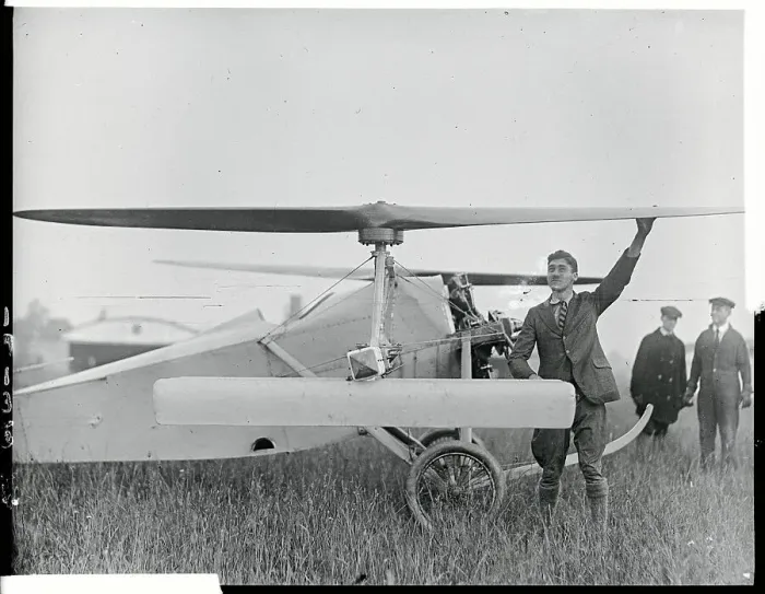Framed Print : Pilot and Assistants with Helicopter Framed Print : Pilot and Assistants with Helicopter
