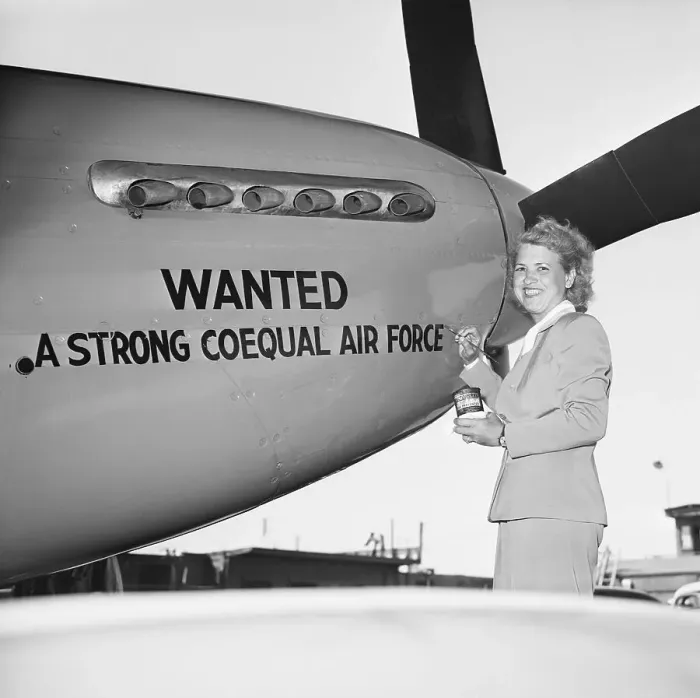 Framed Print : Pilot Jacqueline Cochran Painting on Plane Framed Print : Pilot Jacqueline Cochran Painting on Plane