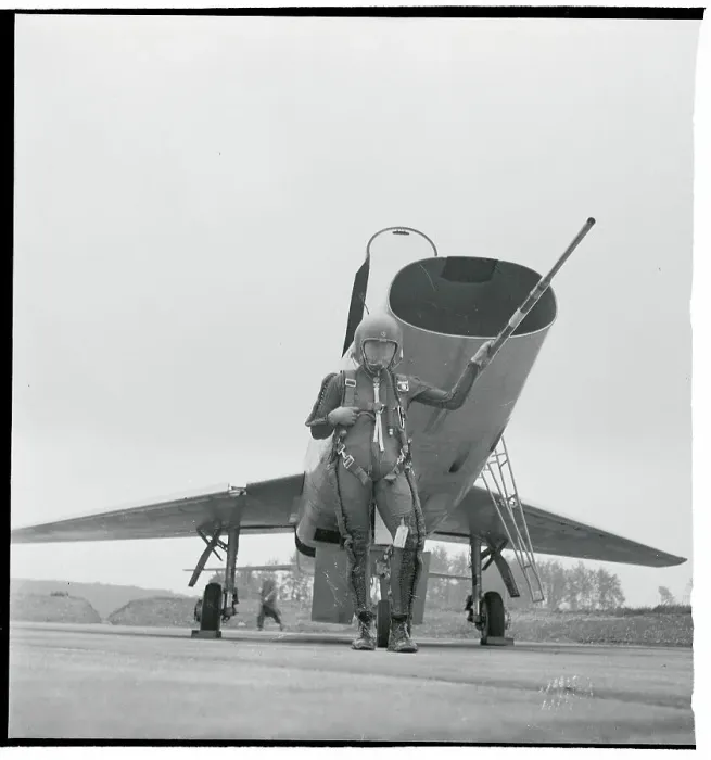 Framed Print : Pilot Posing Near a Supersonic Jet Framed Print : Pilot Posing Near a Supersonic Jet
