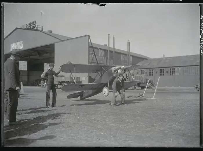 Framed Print : Pilot Posing with His Plane Framed Print : Pilot Posing with His Plane