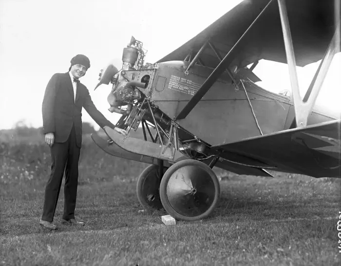 Framed Print : Pilot Posing By His Plane Framed Print : Pilot Posing By His Plane