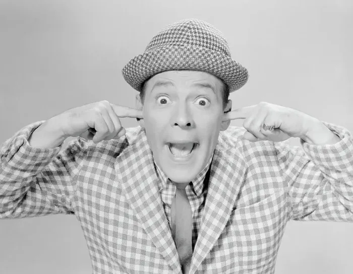 Framed Print : Pinky Lee. Comedian Pinky Lee in his trademark checked suits and his fingers in his ears Framed Print : Pinky Lee. Comedian Pinky Lee in his trademark checked suits and his fingers in his ears