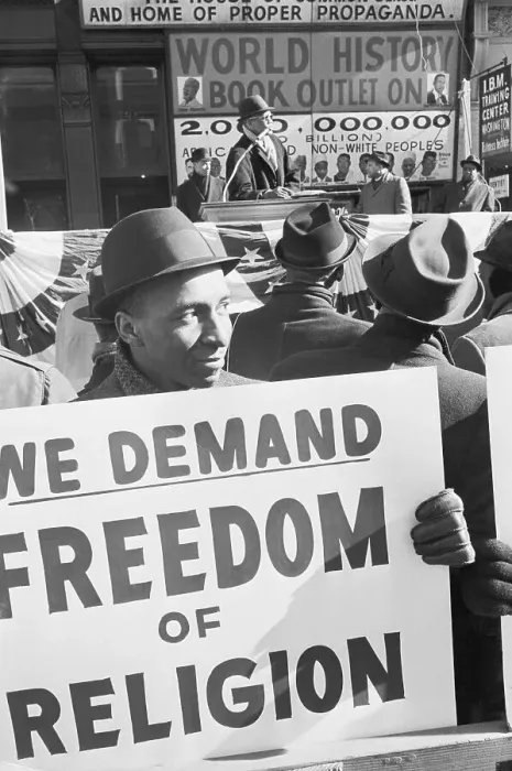 Framed Print : Placard Carrying Supporter of Malcolm X Framed Print : Placard Carrying Supporter of Malcolm X
