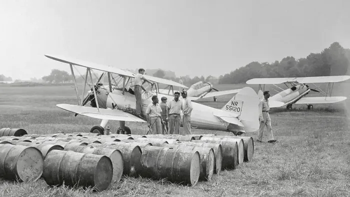 Framed Print : Plane and Crew Waiting for Flight with DDT Framed Print : Plane and Crew Waiting for Flight with DDT