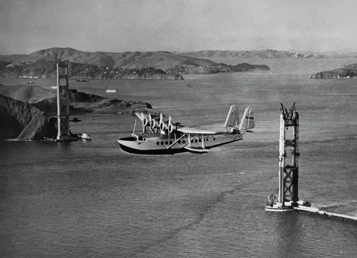 Framed Print : Plane Flies Past Golden Gate Bridge Under Construction Framed Print : Plane Flies Past Golden Gate Bridge Under Construction