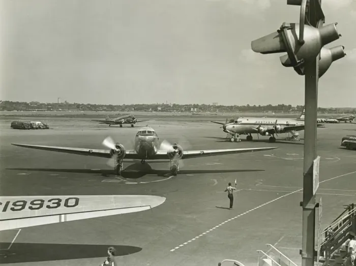 Framed Print : Planes on runway, (B&W), elevated view Framed Print : Planes on runway, (B&W), elevated view