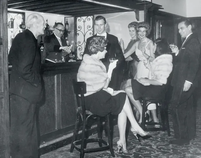 Framed Print : Playboy Club Members Drinking at Bar Framed Print : Playboy Club Members Drinking at Bar