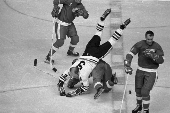 Framed Print : Player Gets Overturned in Hockey Game Framed Print : Player Gets Overturned in Hockey Game