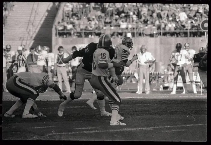 Framed Print : Player Trying to Block Joe Montana's Pass Framed Print : Player Trying to Block Joe Montana's Pass