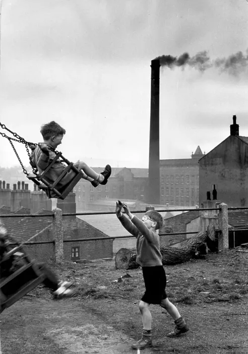 Framed Print : Playtime. May 1955: Children play outdoors within sight of the smoke Framed Print : Playtime. May 1955: Children play outdoors within sight of the smoke