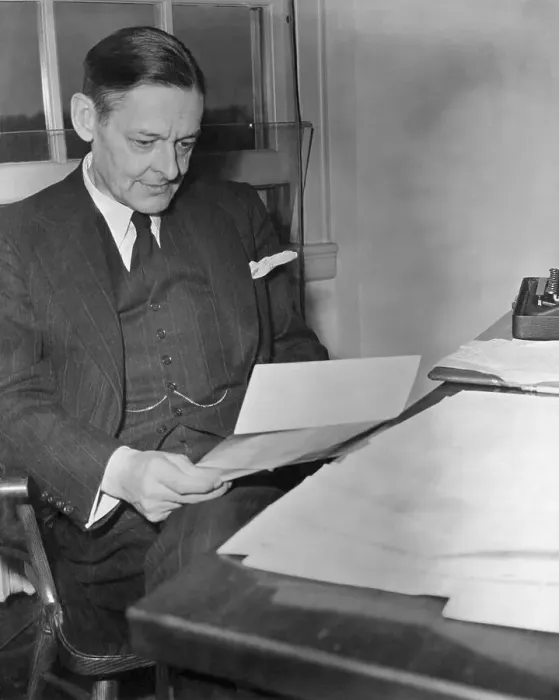Framed Print : Poet T.S. Eliot Reading a Manuscript Framed Print : Poet T.S. Eliot Reading a Manuscript