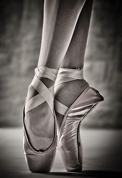 On Point. Close-up of professional ballet dancer on pointe