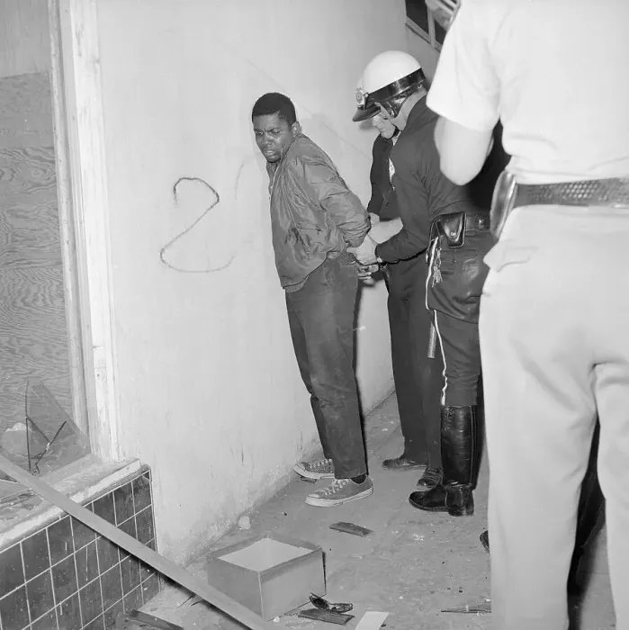 Framed Print : Police Arresting Black Man Framed Print : Police Arresting Black Man