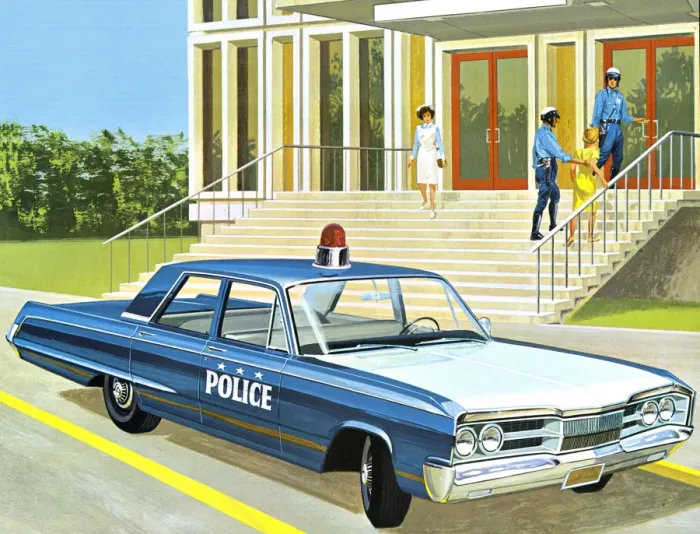 Framed Print : Police Car Parking in Front of a Building Framed Print : Police Car Parking in Front of a Building
