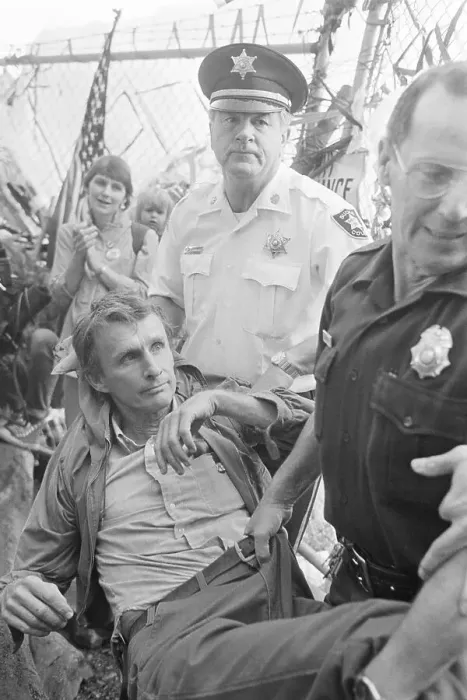 Framed Print : Police Carrying Protester By Pants Framed Print : Police Carrying Protester By Pants