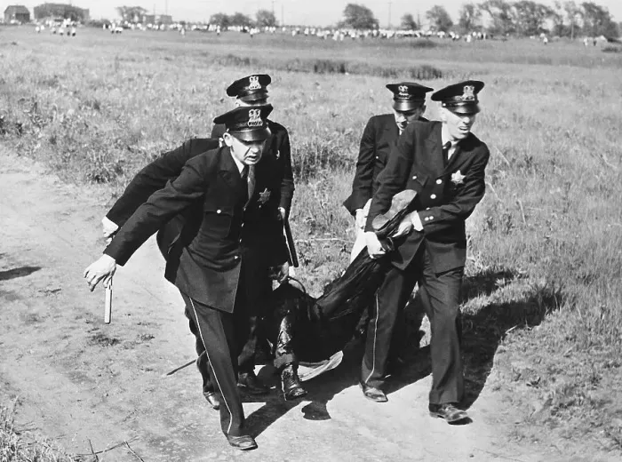 Framed Print : Police Carrying Wounded Steel Striker Framed Print : Police Carrying Wounded Steel Striker