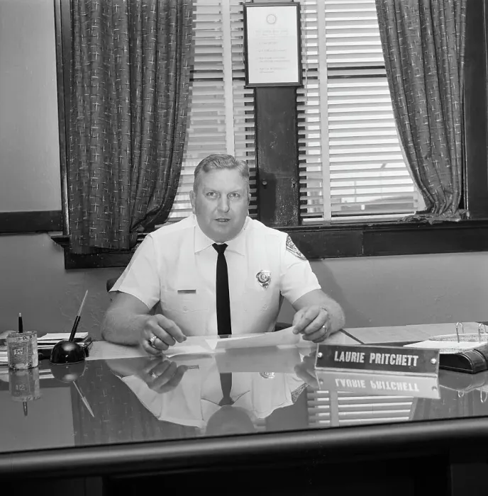 Framed Print : Police Chief Pritchett Sitting Behind Desk