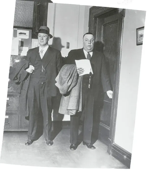Framed Print : Police Chief and Warden Arriving for Extradition of Suspect Framed Print : Police Chief and Warden Arriving for Extradition of Suspect