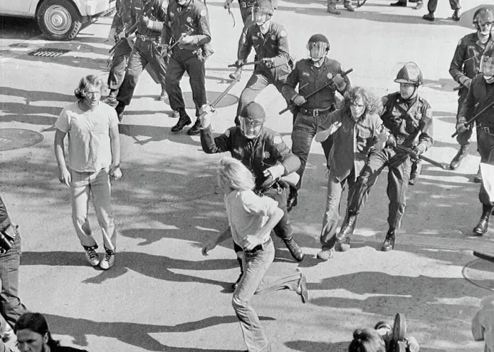 Framed Print : Police with Clubs Chasing Demonstrators Framed Print : Police with Clubs Chasing Demonstrators