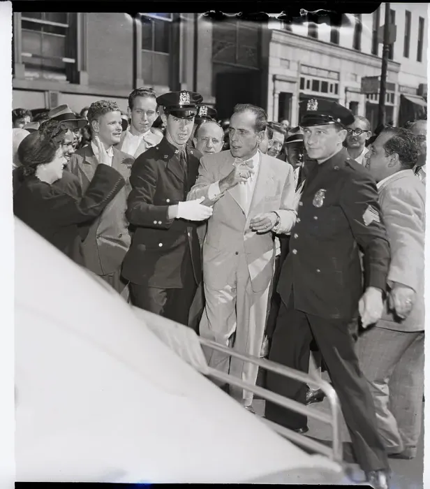 Framed Print : Police Escort Humphrey Bogart Past Crowd Framed Print : Police Escort Humphrey Bogart Past Crowd