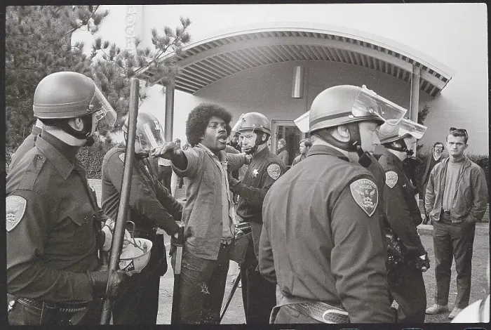 Framed Print : Police Frisking Demonstrator Framed Print : Police Frisking Demonstrator