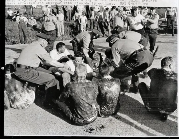Framed Print : Police Grabbing Oil-Covered Picketers Framed Print : Police Grabbing Oil-Covered Picketers