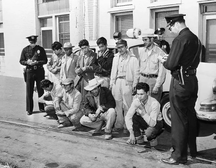 Framed Print : Police With Group of Mexican Workers Framed Print : Police With Group of Mexican Workers