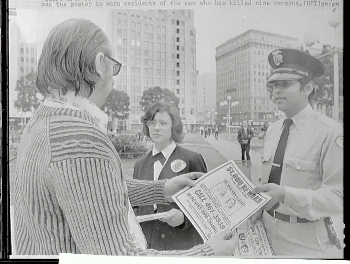 Framed Print : Police Hand out Flyer on Skid Row Slasher Framed Print : Police Hand out Flyer on Skid Row Slasher
