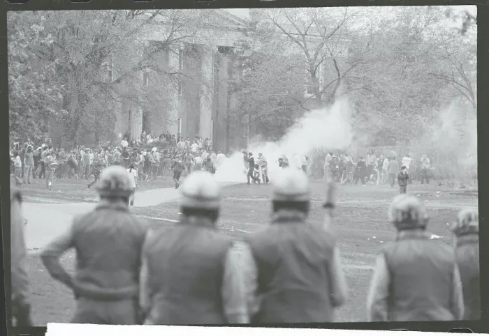 Framed Print : Police Moving in on Protesters