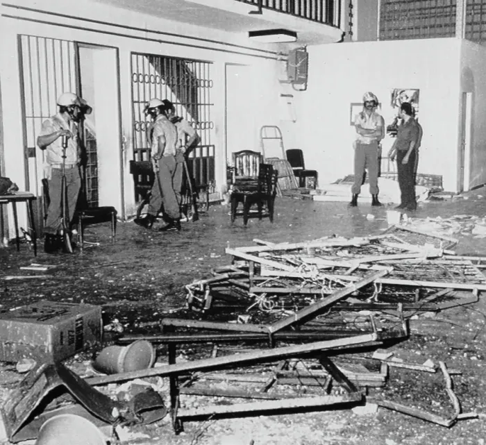 Framed Print : Police Observe Damage Caused by Demonstrating Prisoners