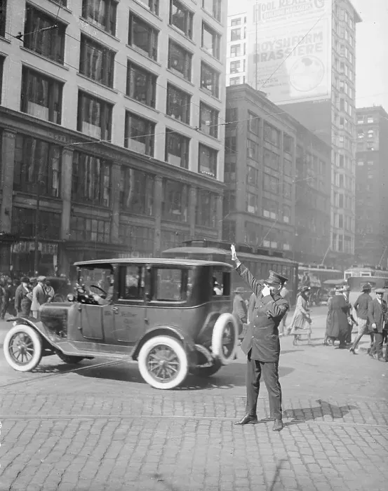 Framed Print : Police Officer Directing Traffic