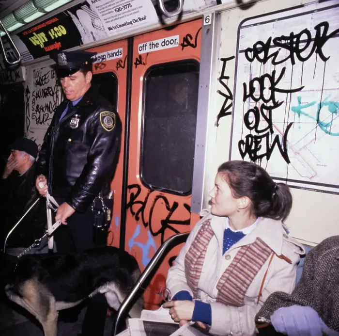 Framed Print : Police Officer with Dog Patrolling Subway in New York Framed Print : Police Officer with Dog Patrolling Subway in New York