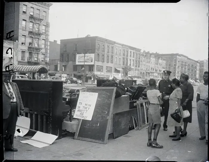 Framed Print : Police Officer Next To Evicted Goods Framed Print : Police Officer Next To Evicted Goods