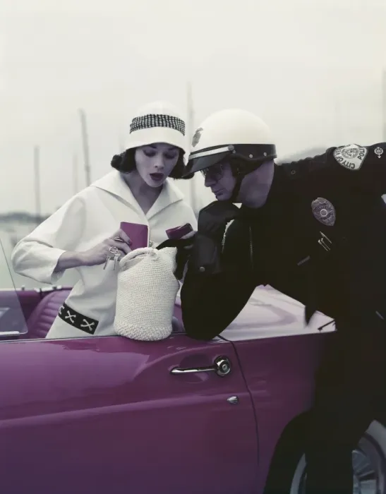 Framed Print : Police officer examining license of woman Framed Print : Police officer examining license of woman