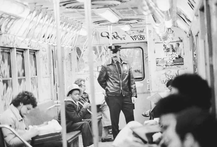 Framed Print : Police Officer Riding Subway Train Framed Print : Police Officer Riding Subway Train