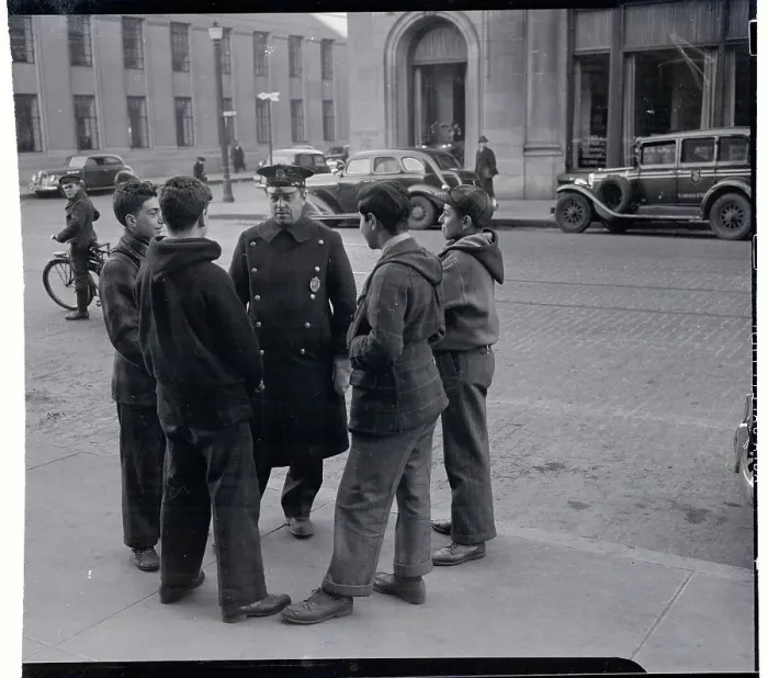 Framed Print : Police Officer Talking to Group of Boys Framed Print : Police Officer Talking to Group of Boys