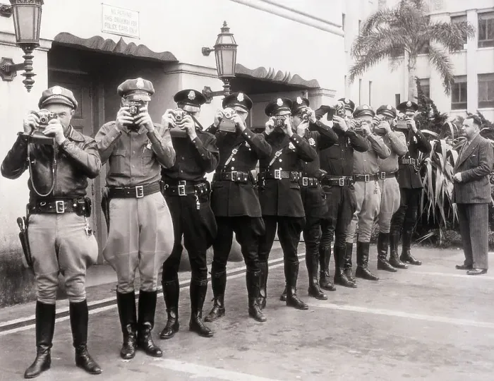 Framed Print : Police Officers Using Their New Cameras Framed Print : Police Officers Using Their New Cameras