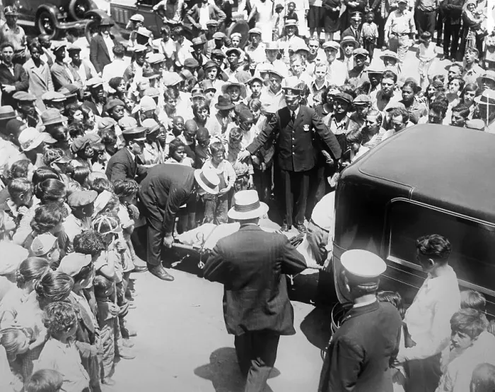 Framed Print : Police Removing Bodies Framed Print : Police Removing Bodies