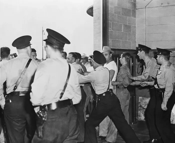 Framed Print : Police Restrain UAW Pickets at Garage Framed Print : Police Restrain UAW Pickets at Garage